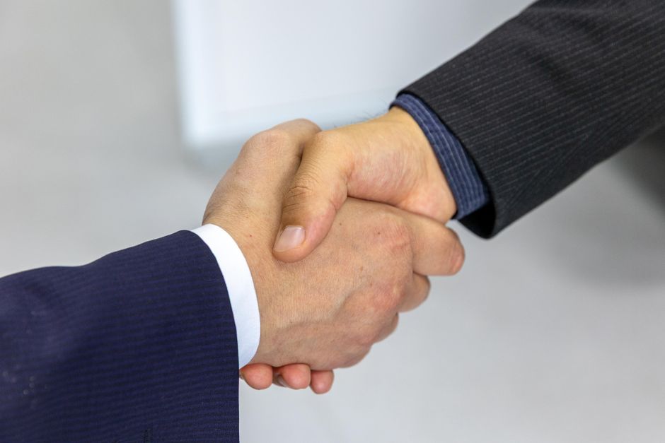 Business meeting handshake